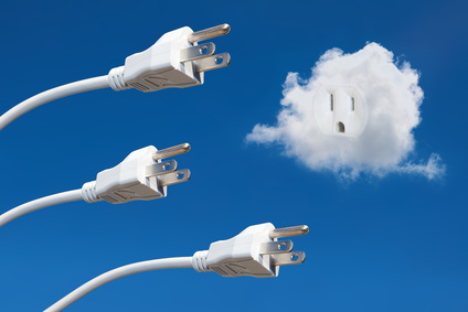 Power cords in the sky with an electrical outlet set in a cloud